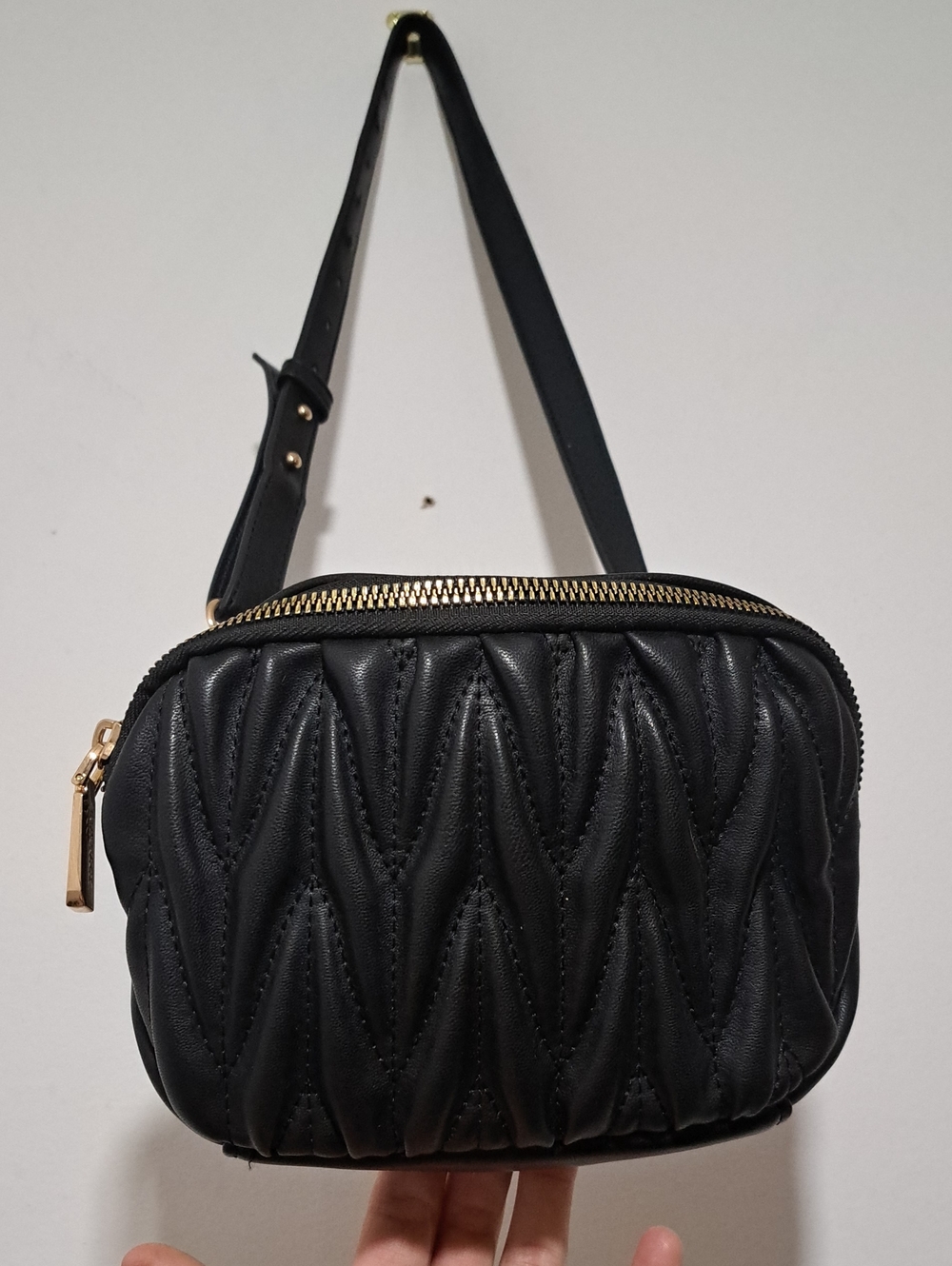 Black Quilted Crossbody Bag with Gold Zipper Accent
